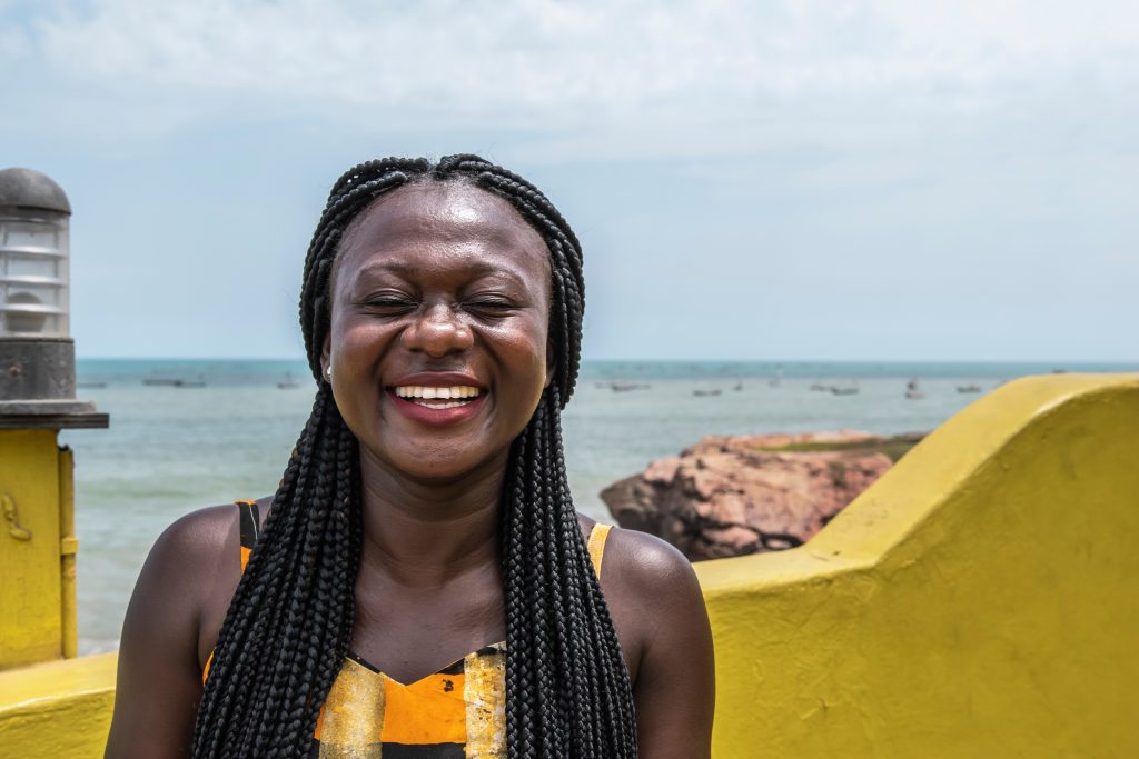 Happy woman in Africa smiling.