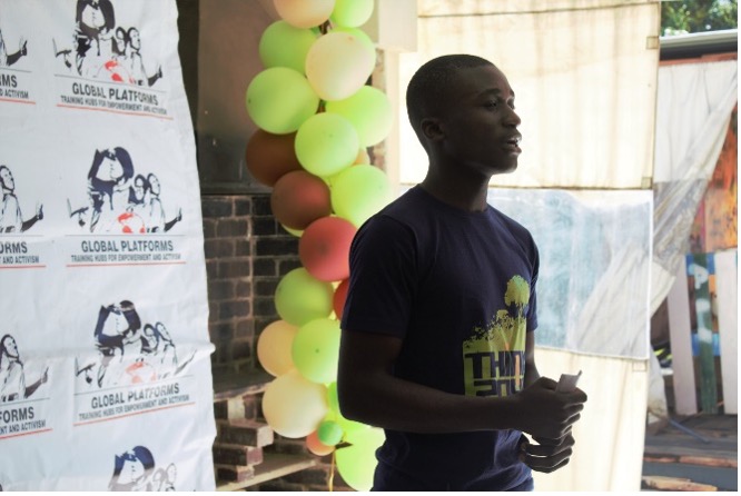 Reuben engaging his fellow young people to raise awareness about the climate change learning strategy